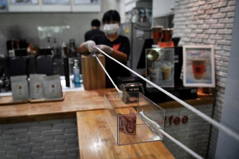 ابتکار یک کافه در شهر بانکوک تایلند برای ردو بدل کردن اسکناس +عکس